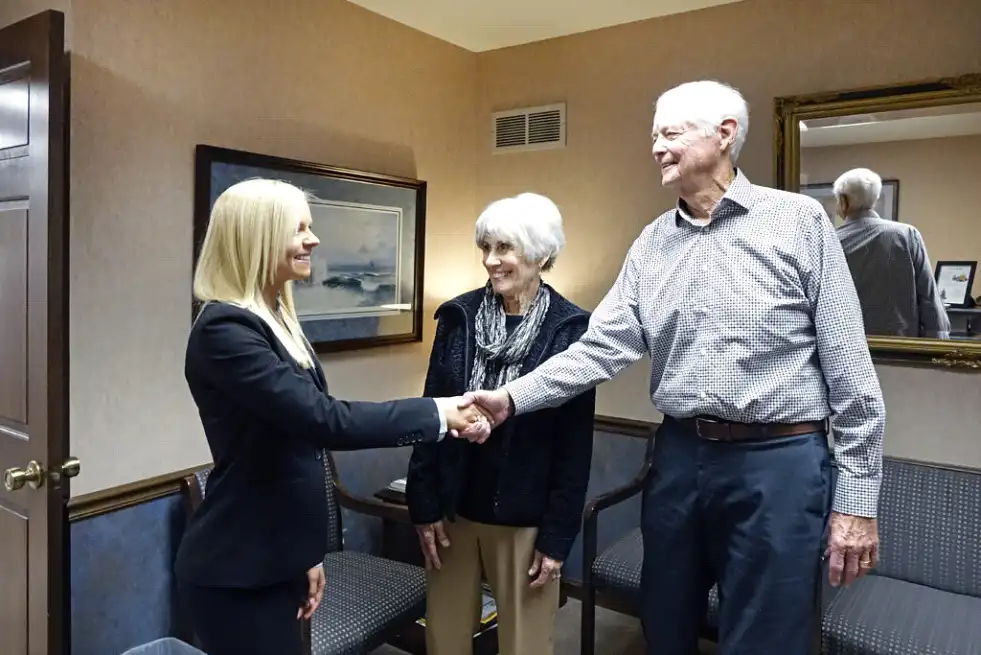 A Goldstar advisor meeting with a family