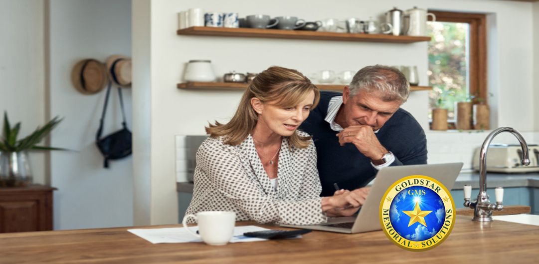 A couple reviewing pre-need plans at home